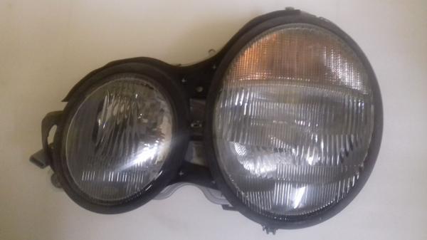 Hauptscheinwerfer links für Mercedes E-Klasse Linksverkehr! Bosch 0986310205 NEU!